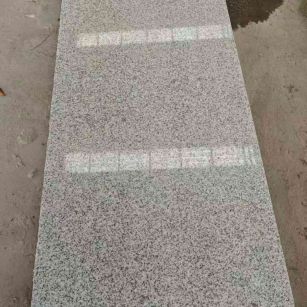 通辽芝麻白光面毛板