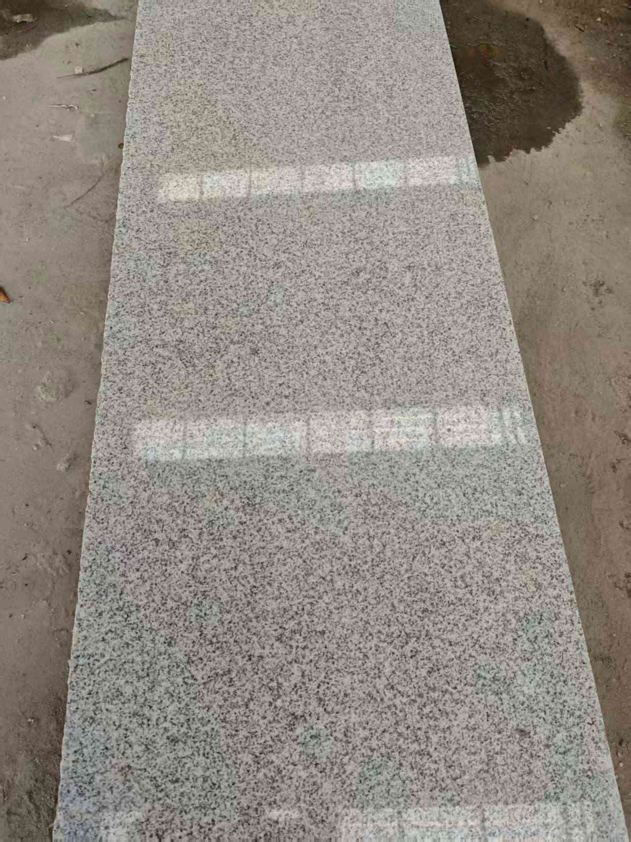 通辽芝麻白光面毛板